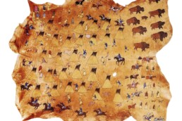 Light brown elk hide painting depicting images of the violent Sand Creek Massacre.